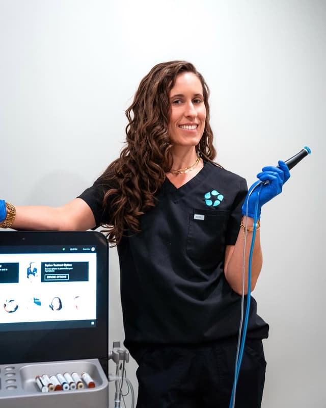 A patient with refreshed, radiant skin after laser treatment