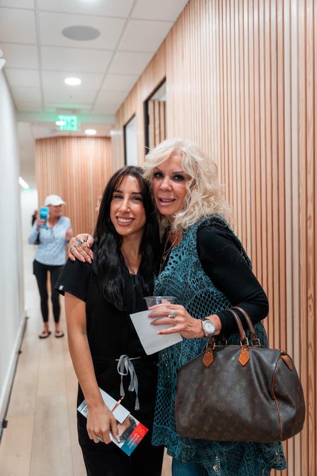 A happy patient with a Relive team member