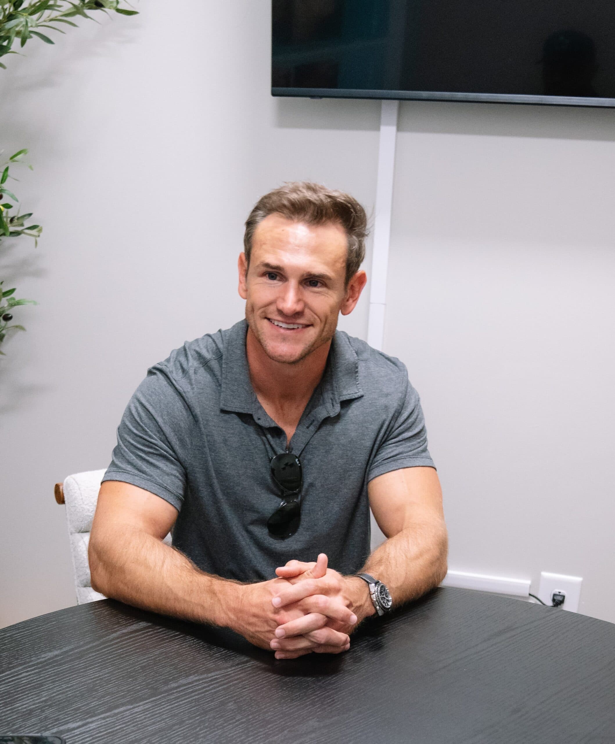 A man sits down for a hormone therapy consultation at Relive Health Stuart