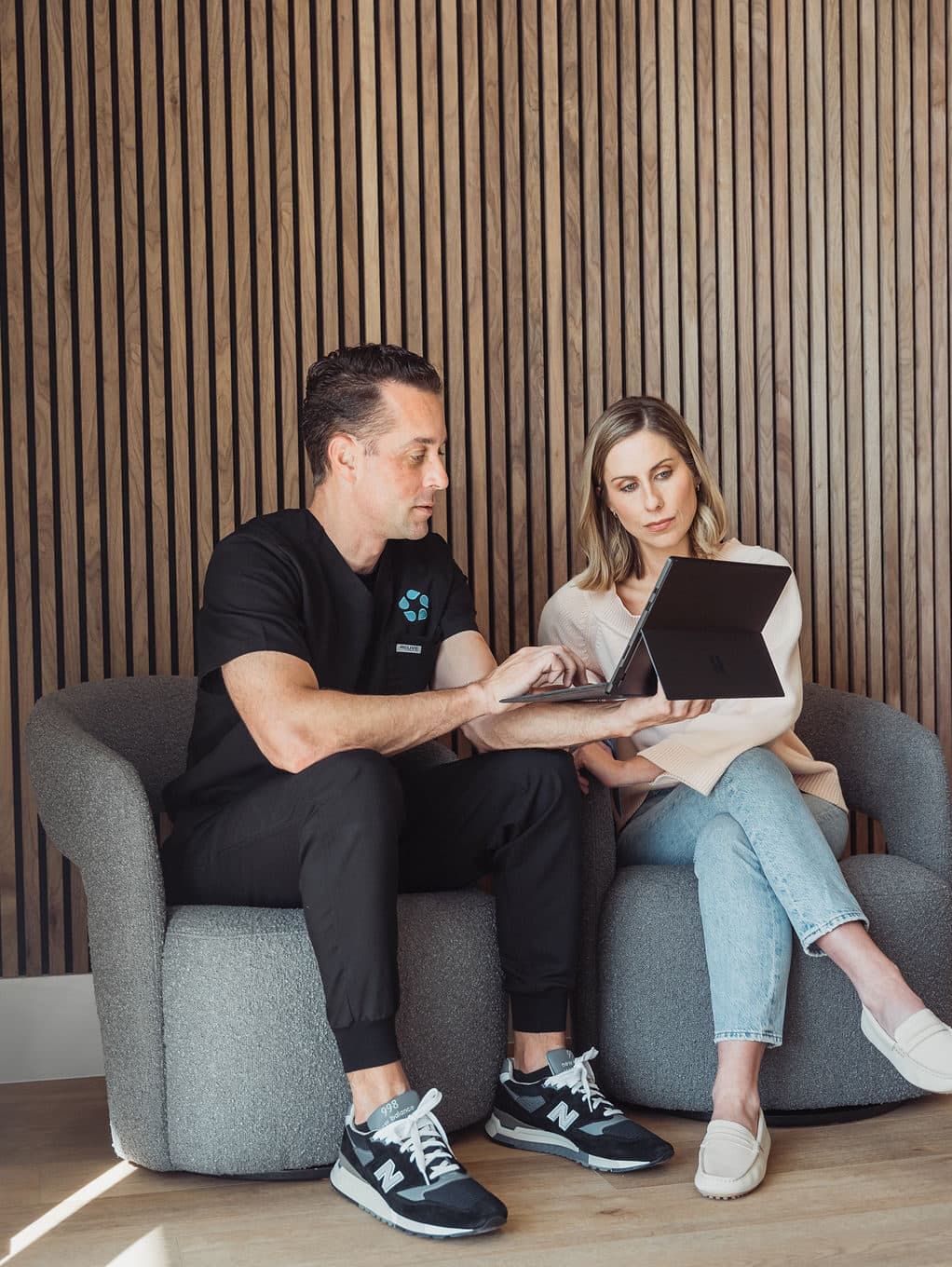 A Relive Health Stuart provider reviews a personalized peptide plan with a patient