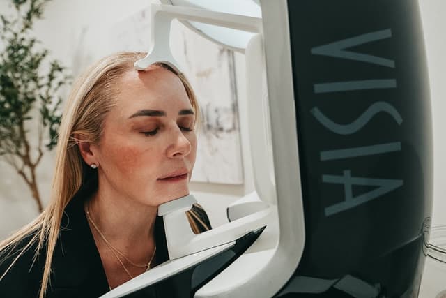 A patient has her skin imaged during a VISIA skin analysis